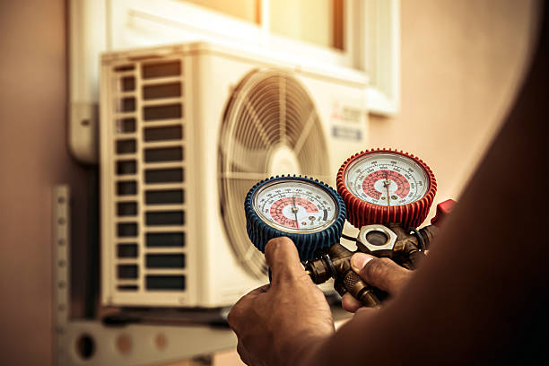 Professional Heat Pump Repair technician working in Alpine, AL